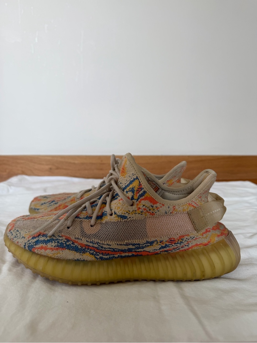 Yeezy 350s - tan with orange and blue accents